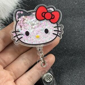 Hello Kitty Badge Reel with Red Bow